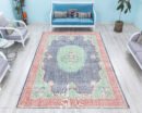 Handwoven Vintage Turkish Rug – Distressed Oriental Area Carpet with Oval Medallion and Bold Botanical Motifs in Navy, Green, and Pink Tones - detail view 2